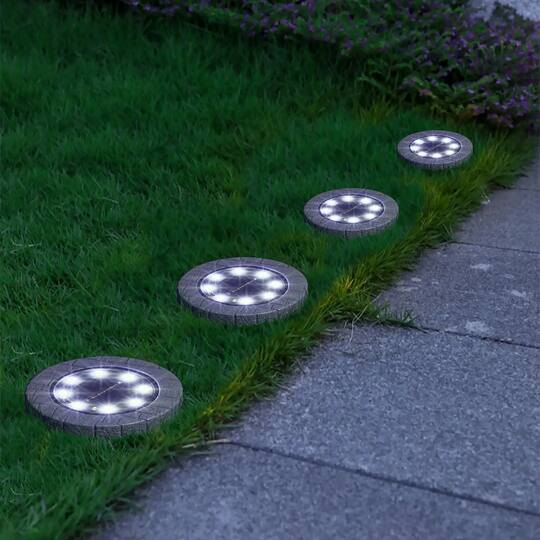 Glitzhome® 5.25" Solar Powered Disk Outdoor Pathway Lights, 4ct.